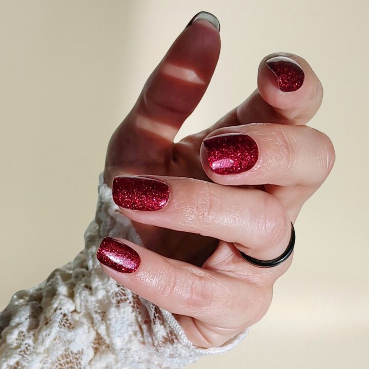 merry-red-glitter-manifix-hand